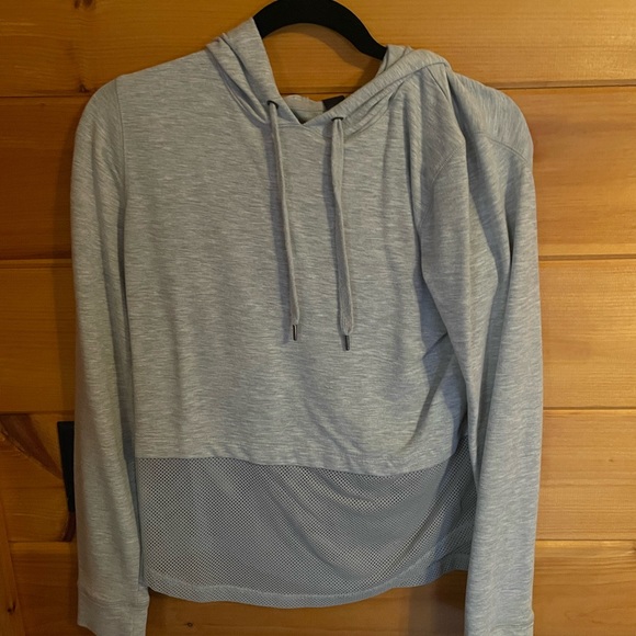Like new cropped sweatshirt mesh material on bottom half. - Picture 5 of 6